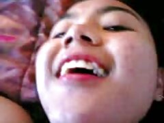 Une femme asiatique suce une grosse bite noire video porno maman et fils